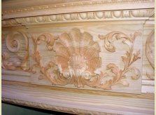 Carved shell motif on bespoke mantelpiece